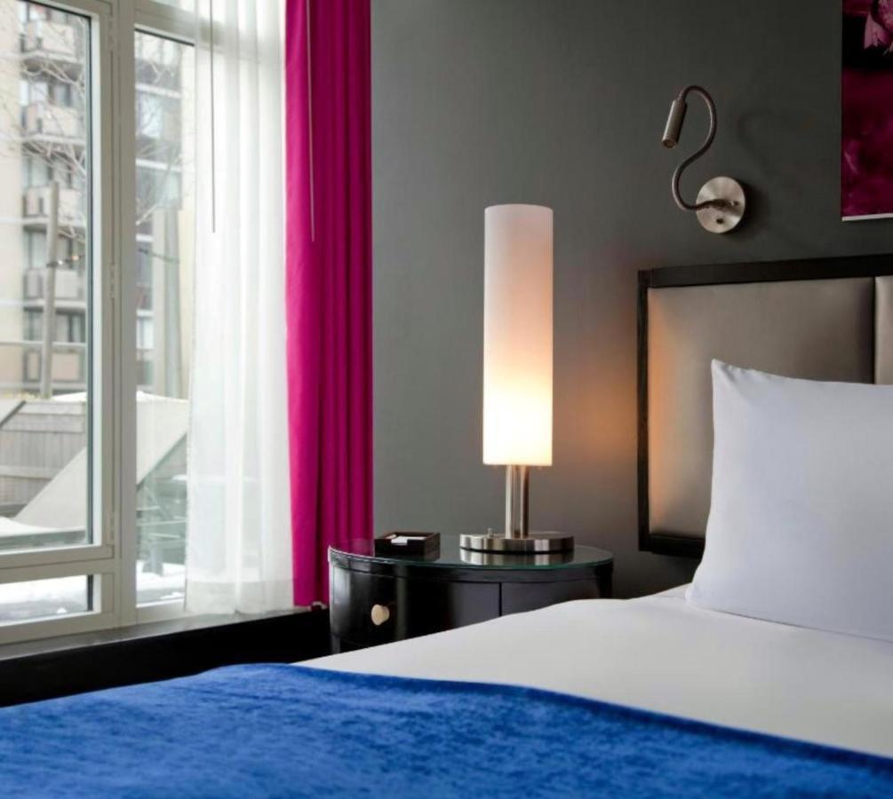 Отель Royalton Park Avenue Нью-Йорк Экстерьер фото A bedroom at the Hotel Indigo